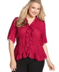 Flaunt your feminine flair this fall with NY Collection's elbow sleeve plus size blouse, accented by ruffled trim. Flaunt your feminine flair this fall with NY Collection's elbow sleeve plus size blouse, accented by ruffled trim.