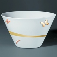 For over two centuries Raynaud has created unique Limoges porcelain, with a marked preference for relief shapes and generously colored and gilt decorations. Metamorphoses is a striking pattern of red and gold with a butterfly motif. For over two centuries Raynaud has created unique Limoges porcelain, with a marked preference for relief shapes and generously colored and gilt decorations. Metamorphoses is a striking pattern of red and gold with a butterfly motif.