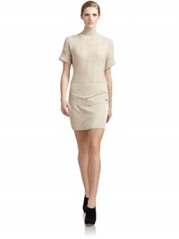 THE LOOKRibbed turtleneck and short sleevesChevron knit patterned bodiceFelted panel at hipsSatin insetsFront metal logo detailTHE FITAbout 36 from shoulder to hemTHE MATERIAL40% wool/25% nylon/20% viscose/15% alpacaCARE & ORIGINDry cleanMade in ItalyModel shown is 5'10 (177cm) wearing US size Small. THE LOOKRibbed turtleneck and short sleevesChevron knit patterned bodiceFelted panel at hipsSatin insetsFront metal logo detailTHE FITAbout 36 from shoulder to hemTHE MATERIAL40% wool/25% nylon/20% viscose/15% alpacaCARE & ORIGINDry cleanMade in ItalyModel shown is 5'10 (177cm) wearing US size Small.