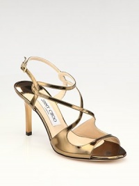From the 24:7 Collection. Gleaming mirrored, metallic leather straps twist and turn.Metallic leather heel, 3¾ (95mm) Open toe Adjustable ankle strap Leather lining and sole Padded insole Made in ItalyOUR FIT MODEL RECOMMENDS ordering true size.. From the 24:7 Collection. Gleaming mirrored, metallic leather straps twist and turn.Metallic leather heel, 3¾ (95mm) Open toe Adjustable ankle strap Leather lining and sole Padded insole Made in ItalyOUR FIT MODEL RECOMMENDS ordering true size..