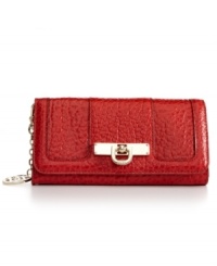 Crafted in finely textured leather with signature golden hardware, this slender design from DKNY is more than meets the eye. A graceful, detachable chain-link strap instantly transforms a wallet into an evening bag, while plenty of card slots, pockets and compartments organize the interior. Crafted in finely textured leather with signature golden hardware, this slender design from DKNY is more than meets the eye. A graceful, detachable chain-link strap instantly transforms a wallet into an evening bag, while plenty of card slots, pockets and compartments organize the interior.