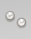 From the Luna Collection. A smooth, round pearl with a sterling silver bead border.8mm pearl Sterling silver Diameter, about ½ Post backs Imported 