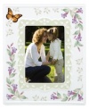 Spring is perpetually in season with whimsical Butterfly Meadow giftware. Colorful blooms and a playful butterfly mingle on this white porcelain picture frame, creating an extra-sweet scene for precious memories.