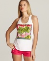 A racerback tank top with palm tree print and beading detail on front.