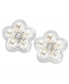 Sophistication meets spring. These petite flower stud earrings are decorated with cultured freshwater pearls (4-4-1/2 mm) at the petals and a gleaming sterling silver setting. Approximate diameter: 1/2 inch.