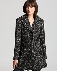 Ultra-refined tweed gets roughened up as sleek leather trim punctuates a sumptuous Burberry Brit coat. Slip the oversized silhouette over skinny pants for a polished look with a hint of punk attitude. Ultra-refined tweed gets roughened up as sleek leather trim punctuates a sumptuous Burberry Brit coat. Slip the oversized silhouette over skinny pants for a polished look with a hint of punk attitude.