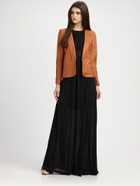 Give your outfit some edge with this exquisite topper, impeccably tailored with fine Italian leather. Notch collarOpen frontLong sleevesFully linedAbout 27 from shoulder to hemLamb skin leatherDry cleanImportedModel is 5'10 (177 cm) wearing a US size 4. Give your outfit some edge with this exquisite topper, impeccably tailored with fine Italian leather. Notch collarOpen frontLong sleevesFully linedAbout 27 from shoulder to hemLamb skin leatherDry cleanImportedModel is 5'10 (177 cm) wearing a US size 4.