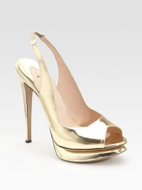 Dramatic platforms in goldtone laminated calf leather with a peep toe.Self-covered heel, 5¼ (130mm) Covered platform, ¾ (20mm) Compares to a 4½ heel (115mm) Peep toe Elasticized slingback strap Leather lining and sole Made in Italy Dramatic platforms in goldtone laminated calf leather with a peep toe.Self-covered heel, 5¼ (130mm) Covered platform, ¾ (20mm) Compares to a 4½ heel (115mm) Peep toe Elasticized slingback strap Leather lining and sole Made in Italy
