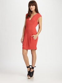 Experience casual, beautiful style in this modern design, with figure-flattering dropped waist and front pockets. V-neckSleevelessSide zip closureAllover pleatingDropped waistDual front slit pocketsFully linedAbout 21 from natural waist98% viscose/2% elastaneDry cleanMade in USAModel shown is 5'10 (177 cm) wearing a US size 4 Experience casual, beautiful style in this modern design, with figure-flattering dropped waist and front pockets. V-neckSleevelessSide zip closureAllover pleatingDropped waistDual front slit pocketsFully linedAbout 21 from natural waist98% viscose/2% elastaneDry cleanMade in USAModel shown is 5'10 (177 cm) wearing a US size 4