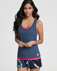 A elegant two layered tank with a ribbed tank beneath a tissue tank. A elegant two layered tank with a ribbed tank beneath a tissue tank.