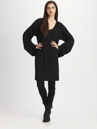 A softer, slouchier take on the essential sweater, this pullover does double duty as an easy top or belted dress.Wide sleeves Rolled hems About 35½ from natural waist Cashmere, dry clean Imported A softer, slouchier take on the essential sweater, this pullover does double duty as an easy top or belted dress.Wide sleeves Rolled hems About 35½ from natural waist Cashmere, dry clean Imported