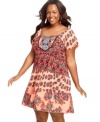 Capture a boho spirit with One World's short sleeve plus size dress, featuring an exotic print.