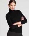 Have a minimalist moment in a chic Lafayette 148 New York turtleneck with a sumptuous merino-wool silhouette.