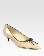 Sophisticated patent leather point toe, grounded by a classic kitten heel. Lacquered heel, 1½ (40mm)Patent leather upperLeather lining and solePadded insoleMade in ItalyOUR FIT MODEL RECOMMENDS ordering one half size up as this style runs small. 