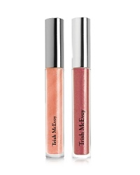 Turn heads with Trish's luminous, long-wearing gloss formulation, designed to enhance your pout with an enticing marriage of high-shine and brilliant points of light for a mirror effect that creates the illusion of fuller lips. This irresistible duo includes complementing pale Petal and punchy Pink, different shades for your different moods. Turn heads with Trish's luminous, long-wearing gloss formulation, designed to enhance your pout with an enticing marriage of high-shine and brilliant points of light for a mirror effect that creates the illusion of fuller lips. This irresistible duo includes complementing pale Petal and punchy Pink, different shades for your different moods.