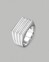 A ridged band of fine silver is finished with etched deisgns on the sides and inside of the band. From the Bedeg Collection Silver 0.52 wide Imported 