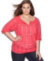 Snag airy style for spring with INC's three-quarter sleeve plus size peasant top, showcasing an eyelet design.