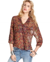 Stylishly slouchy, this floral-print Free People blouse looks effortlessly chic atop distressed denim! Stylishly slouchy, this floral-print Free People blouse looks effortlessly chic atop distressed denim!