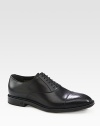 Lace-up shoe in leather with micro diamante trimmed cap toe.Rubber soleMade in Italy
