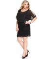 Sheer details, split sleeves and sequined lace make this plus size Onyx dress a fun, flirty option for your next soiree. (Clearance)