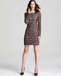 Beaded lace exudes an ornate look on this oh-so-sophisticated Aidan Mattox dress, demure in a long sleeved silhouette. Beaded lace exudes an ornate look on this oh-so-sophisticated Aidan Mattox dress, demure in a long sleeved silhouette.