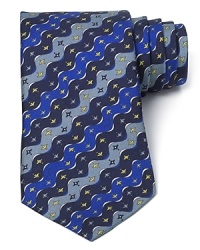Festooned with a brilliant wavy stripe pattern that reflects Emilio Pucci's lavish aesthetics, this handsome tie is crafted from pure Italian silk for a classic dose of masculine luxury. Festooned with a brilliant wavy stripe pattern that reflects Emilio Pucci's lavish aesthetics, this handsome tie is crafted from pure Italian silk for a classic dose of masculine luxury.