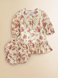 A sweet floral print adorns this girlie dress that comes with matching bloomers.Peter Pan collarLong sleeves with ruffled hemButton-frontDrop waistRuffled hemCottonMachine washImported Please note: Number of buttons may vary depending on size ordered. A sweet floral print adorns this girlie dress that comes with matching bloomers.Peter Pan collarLong sleeves with ruffled hemButton-frontDrop waistRuffled hemCottonMachine washImported Please note: Number of buttons may vary depending on size ordered.