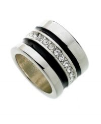 Add extra punch to your look in bold style that sparkles. GUESS ring features a simple band decorated with a row of round-cut crystals and two black enamel stripes. Set in silver tone mixed metal. Size 7.