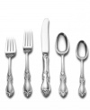 The exquisite sterling silver Queen Elizabeth pattern pays homage to a golden age. Delicate flowers grace the tip and intricate openwork finishes the neck of well-balanced flatware settings made for special occasions. From Towle.