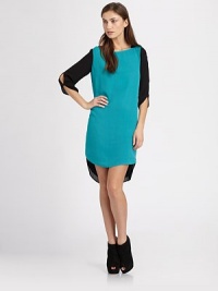 Bold colorblock adds just the right graphic pop to this effortless silk shift.BoatneckSplit three-quarter sleevesFlat frontHi-lo shirttail hemBack button placketAbout 23 from natural waistSilkDry cleanImportedModel shown is 5'10 (177cm) wearing US size 4. Bold colorblock adds just the right graphic pop to this effortless silk shift.BoatneckSplit three-quarter sleevesFlat frontHi-lo shirttail hemBack button placketAbout 23 from natural waistSilkDry cleanImportedModel shown is 5'10 (177cm) wearing US size 4.