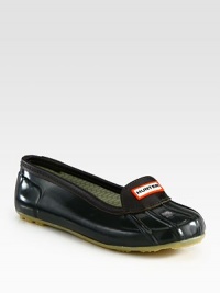 A durable silhouette with leather trim for rainy days, finished with a rubber sole for added traction. Rubber and leather upperLeather liningRubber solePadded insoleImported A durable silhouette with leather trim for rainy days, finished with a rubber sole for added traction. Rubber and leather upperLeather liningRubber solePadded insoleImported