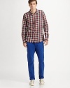 Crisp, cool cotton in a flawless, straight-leg fit makes this richly-hued chino an exciting complement to your off-duty wardrobe.Flat-front styleSide slash, back welt pocketsInseam, about 34CottonMachine washImported