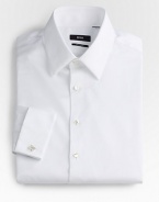 A formal style woven with a subtle diamond texture in crisp cotton. Buttonfront Modified point collar Bluff edge French cuffs Cotton; dry clean Imported 