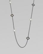 From the Midnight Pearl Collection. This lovely style features diamond accents, quatrefoils and lustrous pearl stations on a sleek, blackened sterling silver box chain. Blackened sterling silverWhite cultured South Sea pearlsDiamonds, .6 tcwLength, about 40Toggle closureImported 