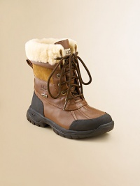 The perfect cold weather style will keep their feet warm and dry all season long. Lace front Embossed UGG logo Sheepskin sock liner Flexible sole with superior traction Removable sheepskin insole Imported The perfect cold weather style will keep their feet warm and dry all season long. Lace front Embossed UGG logo Sheepskin sock liner Flexible sole with superior traction Removable sheepskin insole Imported