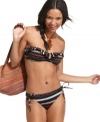 Roxy puts a tribal print twist on a classic bandeau bikini top! The ruffle on top gives it extra feminine appeal.
