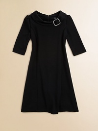 Like a cocktail dress for the younger set, this simple, shapely ponté knit style has all the elegance of the grown-up version.Ballerina necklineFoldover collar with sparkly jeweled buckleBelow-the-elbow sleevesGracefully flared shapeBack zip close74% polyester/21% rayon/5% spandexMachine washImported Like a cocktail dress for the younger set, this simple, shapely ponté knit style has all the elegance of the grown-up version.Ballerina necklineFoldover collar with sparkly jeweled buckleBelow-the-elbow sleevesGracefully flared shapeBack zip close74% polyester/21% rayon/5% spandexMachine washImported