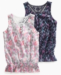 Set for summer. She can keep cute and cool in this light peplum tank from Epic Threads. Set for summer. She can keep cute and cool in this light peplum tank from Epic Threads.