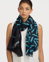 A smooth silk style that features a graphic, abstract lip print. SilkAbout 40 X 67Dry cleanImported 