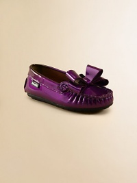 Crafted from shiny patent leather, this stylish pair features an outstanding bow.Slip-on stylePatent leather upperRubber solePadded insoleImported Crafted from shiny patent leather, this stylish pair features an outstanding bow.Slip-on stylePatent leather upperRubber solePadded insoleImported