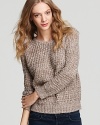 Shift to neutral with a loose-weave knit pullover for style, comfort and versatility.