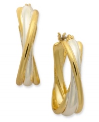 Stir up your style with these twisted oval hoop earrings from Charter Club. The two-tone style shines with unparalleled radiance. Crafted in gold and silver tone mixed metal. Approximate drop: 9/10 inch. Stir up your style with these twisted oval hoop earrings from Charter Club. The two-tone style shines with unparalleled radiance. Crafted in gold and silver tone mixed metal. Approximate drop: 9/10 inch.