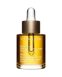 Soothing relief for Dry or Extra-Dry skin. 100% pure plant extracts. Zero preservatives. Clarins essential oils of Sandalwood, Cardamon and Lavender tone, soothe, comfort and decongest skin that is dry, irritated or stressed. Hazelnut Oil softens, smoothes and reduces redness. Helps prevent moisture loss and the formation of fine lines. Non-staining. In the evening, after thorough cleansing and toning, apply a small amount to face and neck still damp with Toning Lotion, avoiding the eye contour. Gently dab face with a soft tissue to remove any excess product. Soothing relief for Dry or Extra-Dry skin. 100% pure plant extracts. Zero preservatives. Clarins essential oils of Sandalwood, Cardamon and Lavender tone, soothe, comfort and decongest skin that is dry, irritated or stressed. Hazelnut Oil softens, smoothes and reduces redness. Helps prevent moisture loss and the formation of fine lines. Non-staining. In the evening, after thorough cleansing and toning, apply a small amount to face and neck still damp with Toning Lotion, avoiding the eye contour. Gently dab face with a soft tissue to remove any excess product.