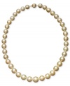 Bring warmth and energy to your look with this sunshine-colored strand. Golden South Sea pearls (10-12-1/2 mm) form a rich, graduated circle around your neck. 14k gold clasp. Approximate length: 18 inches.