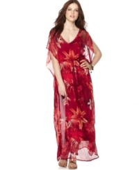 Transport yourself to faraway lands in this breezy caftan, featuring a tropical floral print from Lucky Brand Jeans. Transport yourself to faraway lands in this breezy caftan, featuring a tropical floral print from Lucky Brand Jeans.