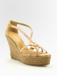 Natural cork wedge with skinny, adjustable straps and classic espadrille texture. Stacked wedge, 4¼ (110mm)Covered platform, 1¼ (30mm)Compares to a 3 heel (75mm)Cork upperLeather liningBuffed leather solePadded insoleMade in ItalyOUR FIT MODEL RECOMMENDS ordering true whole size; ½ sizes should order the next whole size up. Natural cork wedge with skinny, adjustable straps and classic espadrille texture. Stacked wedge, 4¼ (110mm)Covered platform, 1¼ (30mm)Compares to a 3 heel (75mm)Cork upperLeather liningBuffed leather solePadded insoleMade in ItalyOUR FIT MODEL RECOMMENDS ordering true whole size; ½ sizes should order the next whole size up.