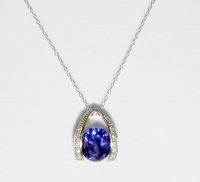 B. Brilliant Sterling Silver & Blue Tanzanite Cubic Zirconia Pendant Necklace B. Brilliant Sterling Silver & Blue Tanzanite Cubic Zirconia Pendant Necklace