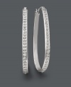 Seamless sparkle for timeless style. These fashionable hoop earrings shine with the addition of round-cut diamond accents. Crafted in sterling silver. Approximate diameter: 1-3/4 inches.