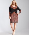 Dressing becomes a breeze with INC's plus size shift dress. An exotic print adds spice to this classic, sleek silhouette.