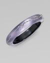 From the Lucite Lavender Dust Collection. A subtly textured, narrow bangle in soft wisteria, crafted of hand-sculpted, hand-painted Lucite, sprinkled with shimmering Swarovski crystals.LuciteCrystalDiameter, about 2¼Width, about ½Hinged with magnetic claspMade in USA